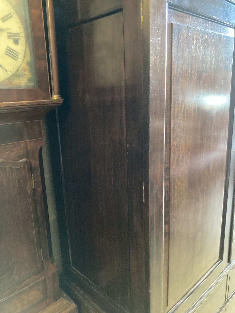 A George III mahogany panelled linen press, width 135cm, depth 62cm, height 190cm